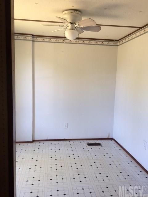 3337 Deal Mill Road Hudson, NC 28638 - Photo 5 of 14 a view of a rack on the wall