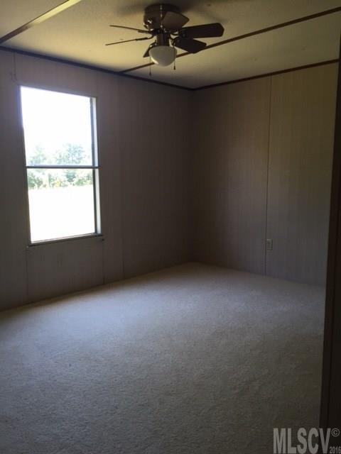 3337 Deal Mill Road Hudson, NC 28638 - Photo 9 of 14 an empty room with a window