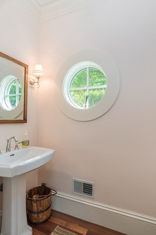 108 Grapevine Road Wenham, MA 01984 - Photo 11 of 37 a bathroom with a sink and a mirror