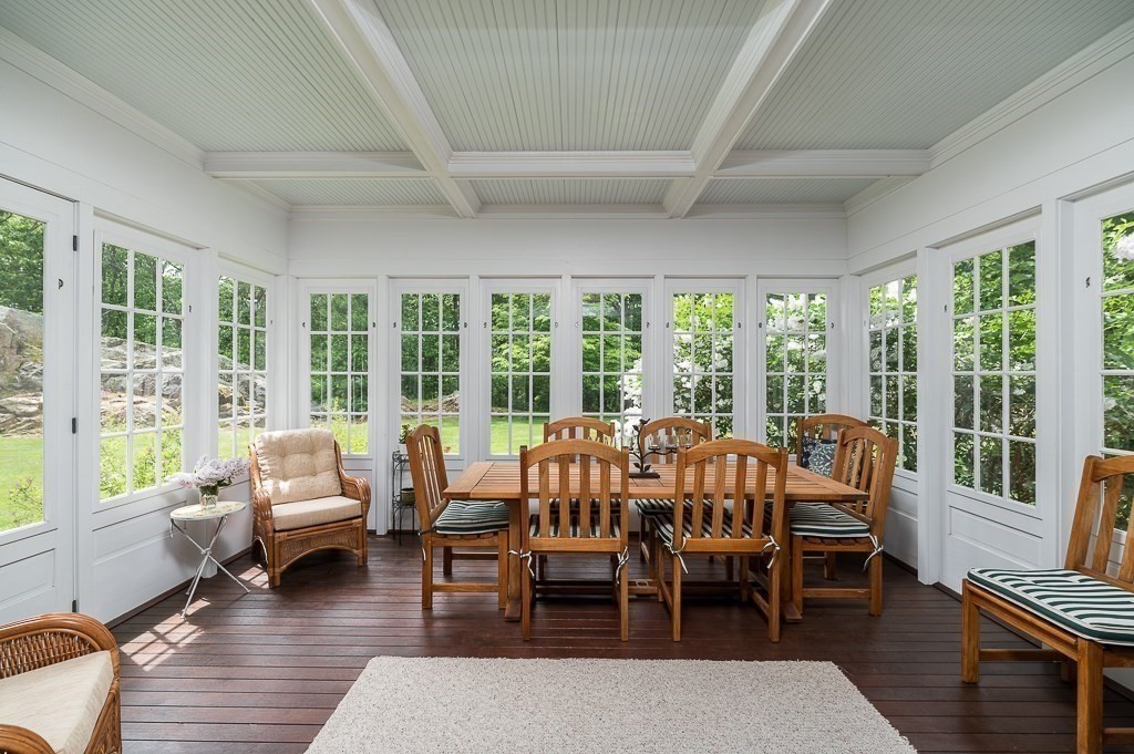 108 Grapevine Road Wenham, MA 01984 - Photo 20 of 37 a view of a dining room with furniture window and wooden floor