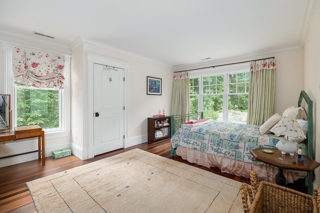 108 Grapevine Road Wenham, MA 01984 - Photo 30 of 37 a bedroom with furniture and a window