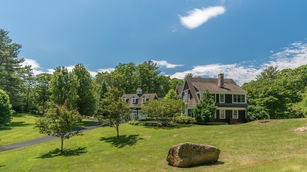 108 Grapevine Road Wenham, MA 01984 - Photo 36 of 37 a house with swimming pool in front of it