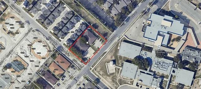 a kitchen with a stove and a sink