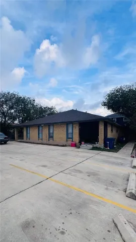 a bathroom with a double vanity sink toilet and bathtub