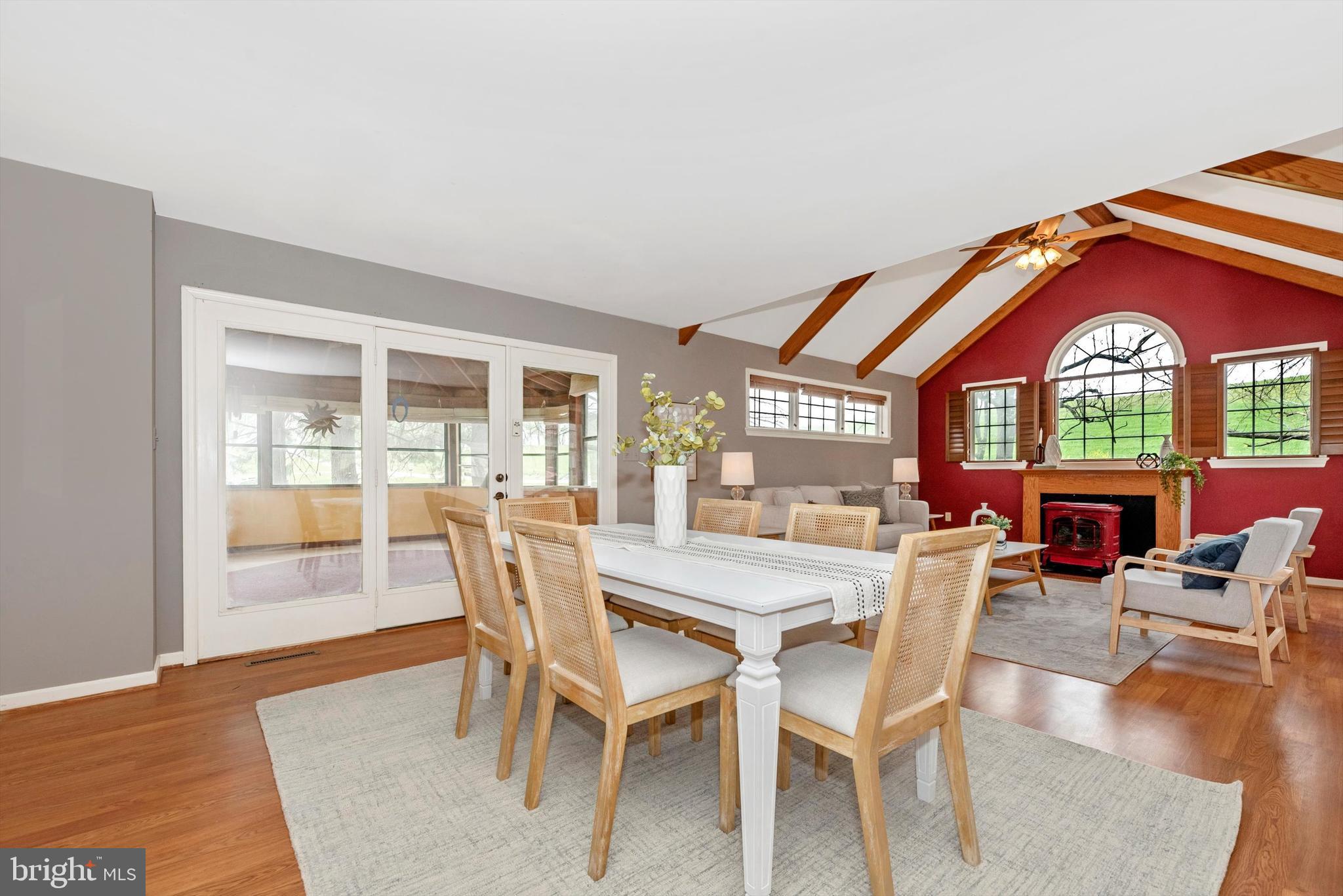 2801 Grandview Drive Middletown, MD 21769 - Photo 15 of 59 a dining room with furniture a rug and wooden floor