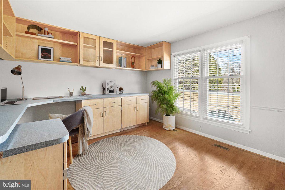 2801 Grandview Drive Middletown, MD 21769 - Photo 7 of 59 a view of a kitchen with a sink hardwood floor and a large window
