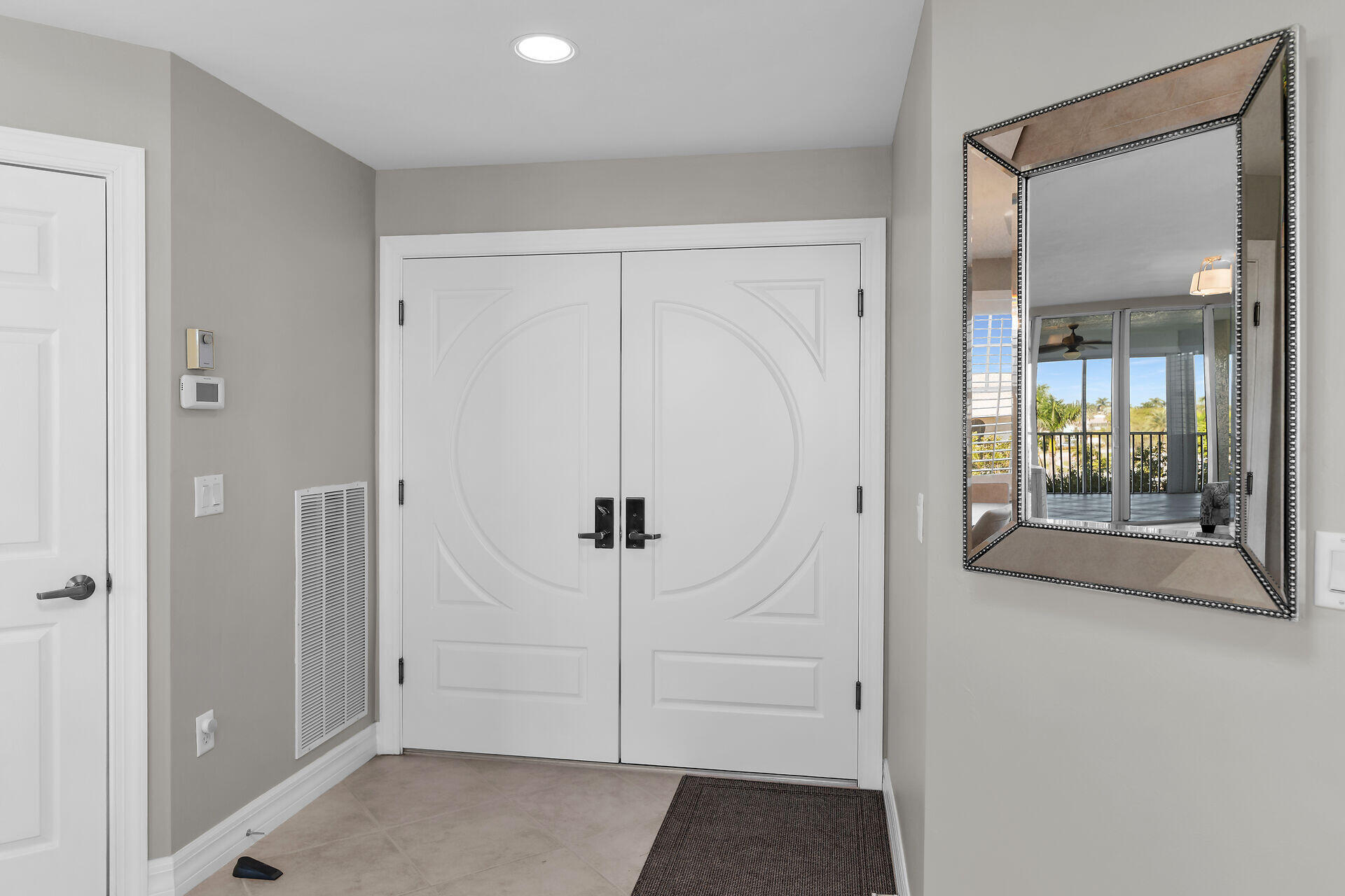 1111 Swallow Avenue, Unit 1401 Marco Island, FL 34145 - Photo 10 of 36 an empty room with window