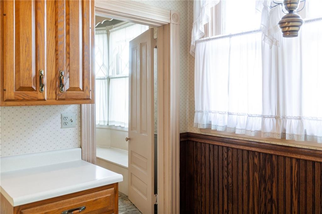 701 Beaver Street Sewickley, PA 15143 - Photo 15 of 39 a bathroom with a window and a shower