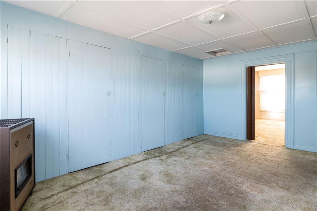 701 Beaver Street Sewickley, PA 15143 - Photo 22 of 39 a view of an empty room with a fireplace