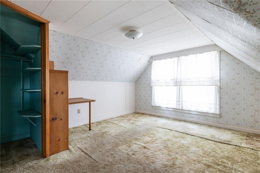 701 Beaver Street Sewickley, PA 15143 - Photo 23 of 39 an empty room with windows and closet