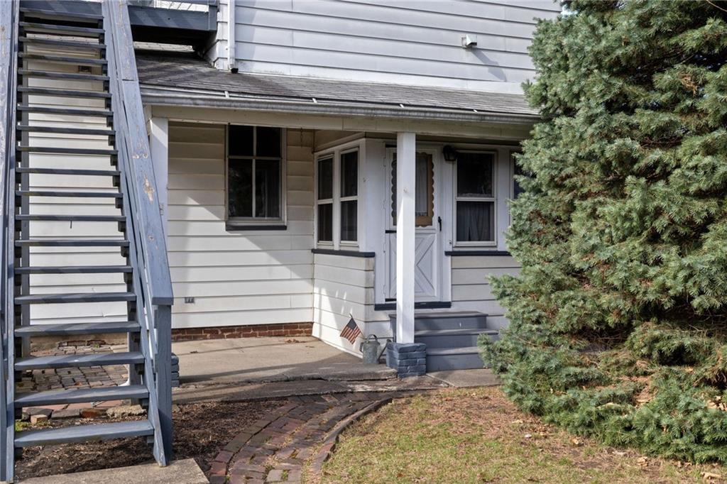 701 Beaver Street Sewickley, PA 15143 - Photo 24 of 39 a front view of a house with a yard