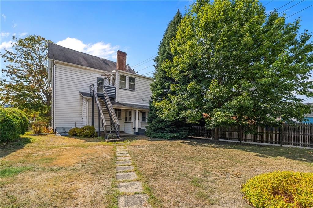 701 Beaver Street Sewickley, PA 15143 - Photo 25 of 39 a front view of house with yard
