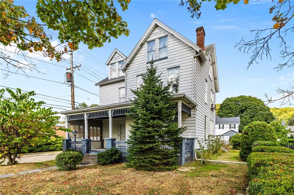 701 Beaver Street Sewickley, PA 15143 - Photo 39 of 39 a view of house with a yard and potted plants