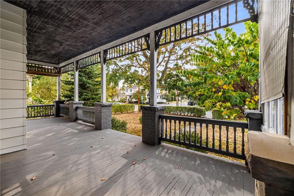 701 Beaver Street Sewickley, PA 15143 - Photo 4 of 39 a view of a porch with wooden floor