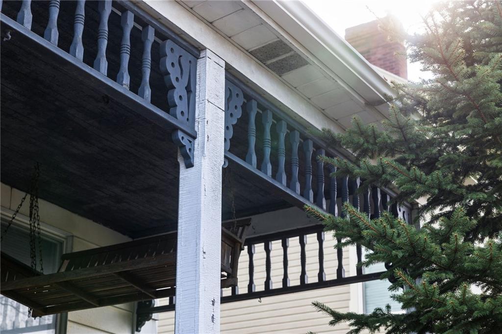 701 Beaver Street Sewickley, PA 15143 - Photo 5 of 39 a view of balcony with wooden floor and stairs