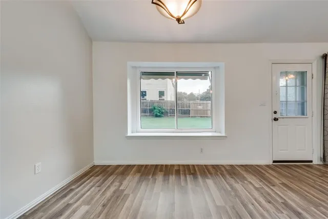 an empty room with window