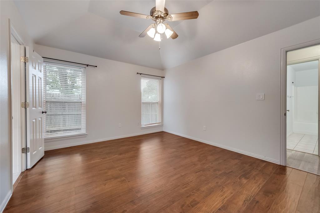 106 South 3rd Avenue Mansfield, TX 76063 - Photo 14 of 30 wooden floor in an empty room with a window