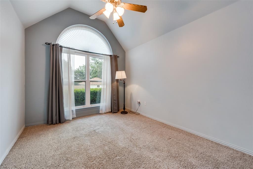 106 South 3rd Avenue Mansfield, TX 76063 - Photo 21 of 30 an empty room with windows and mirror