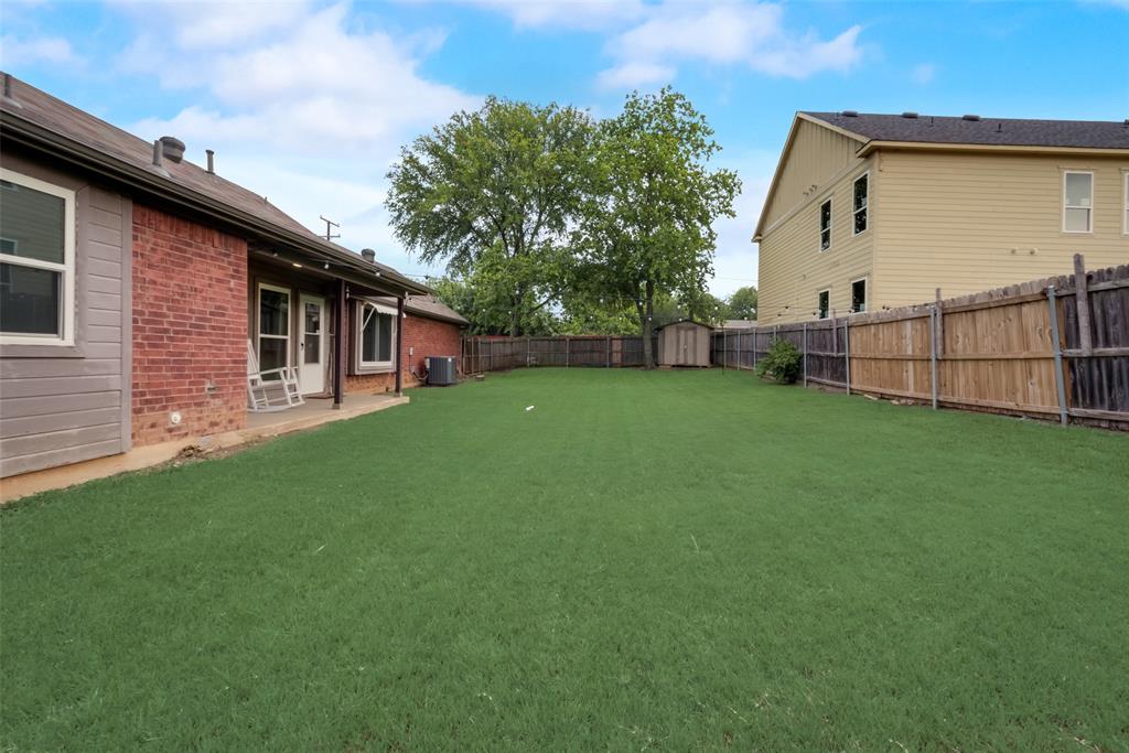 106 South 3rd Avenue Mansfield, TX 76063 - Photo 26 of 30 a view of a house with a yard