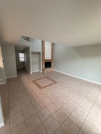a view of a livingroom with a fireplace