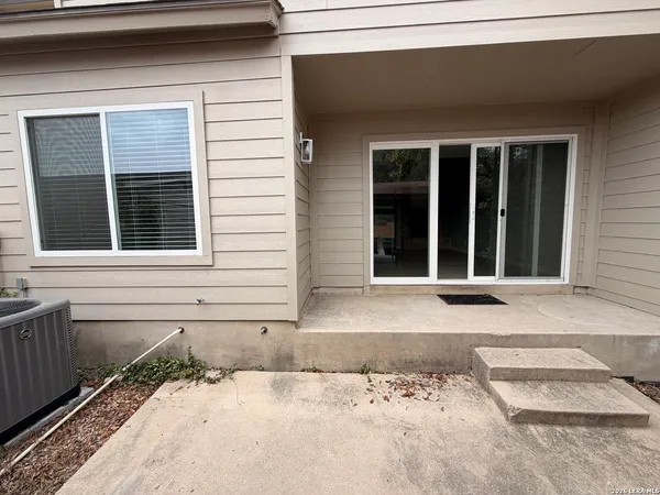 a view of entrance gate of a house