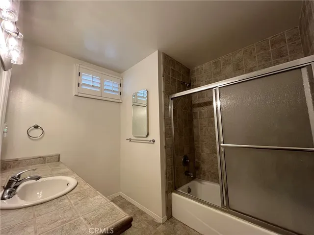 a bathroom with a sink and a tub