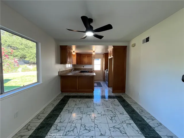 a view of a refrigerator in a room