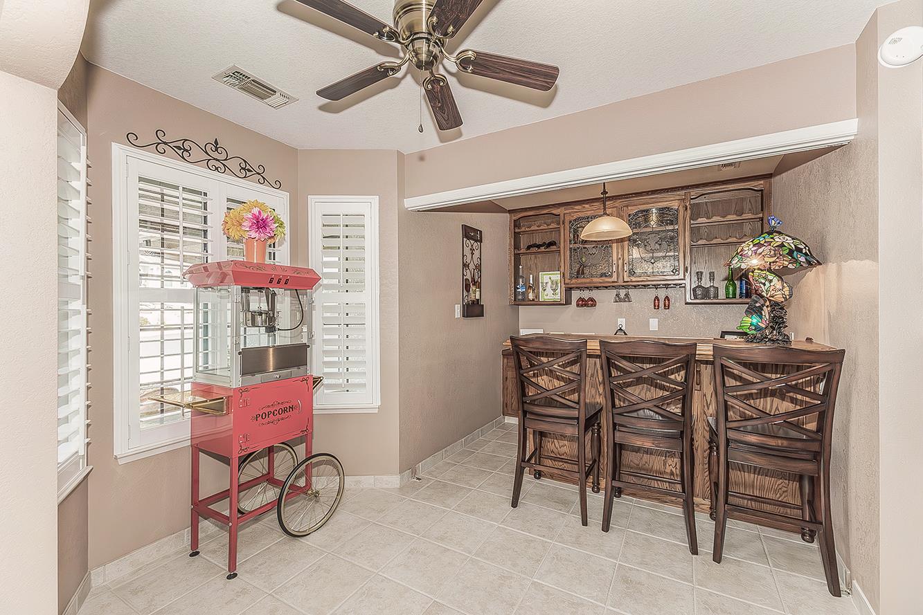 1405 West Flora Avenue Reedley, CA 93654 - Photo 11 of 61 a view of a livingroom with furniture and a window