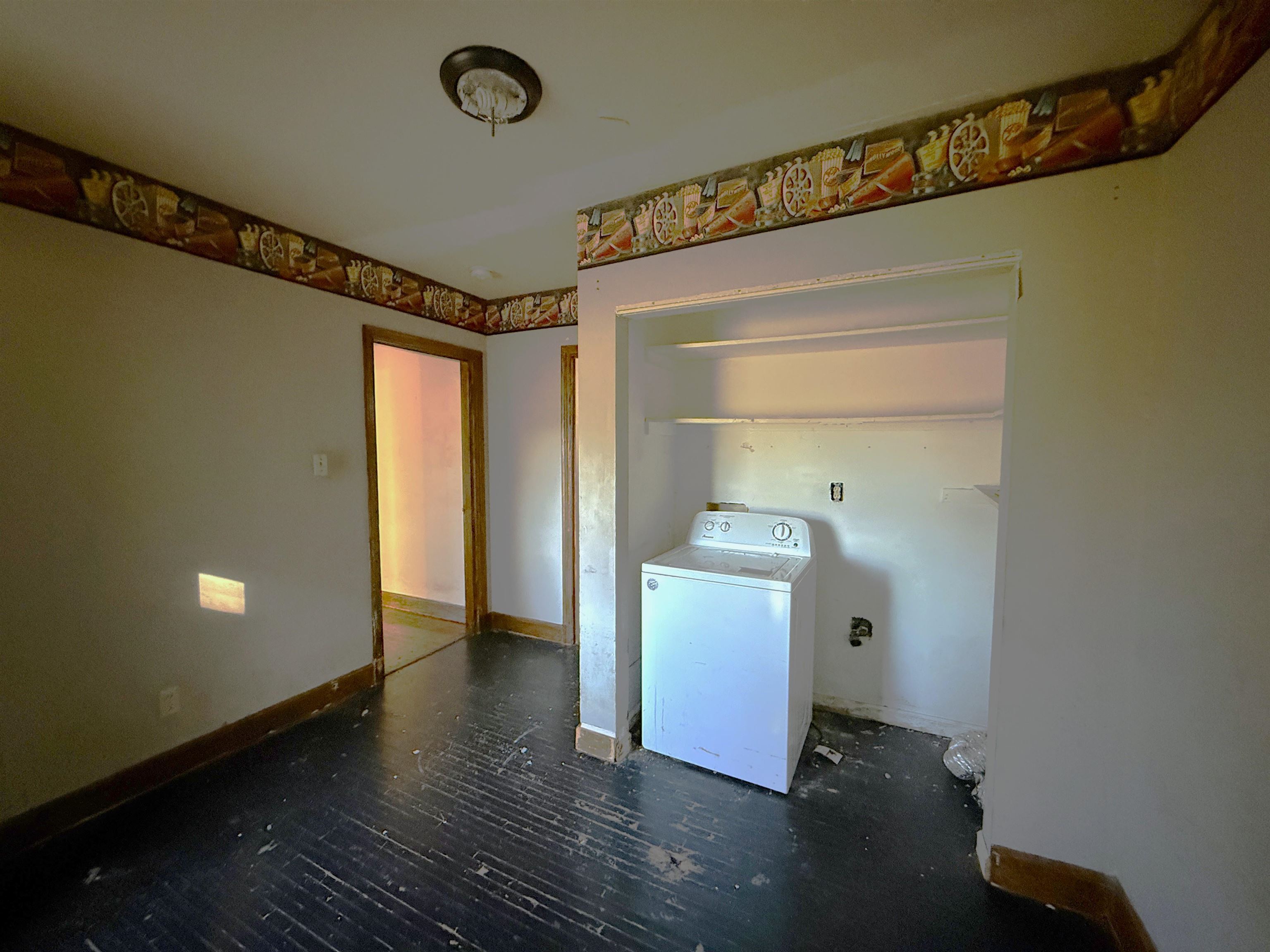 1229 Marlin Road Memphis, TN 38116 - Photo 8 of 20 Laundry area with baseboards and washer / clothes dryer