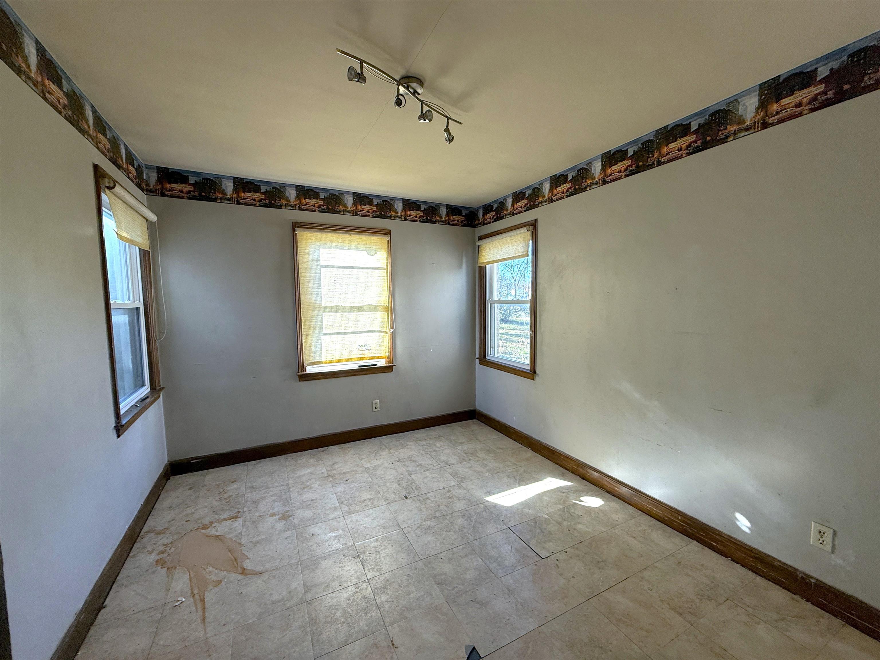 1229 Marlin Road Memphis, TN 38116 - Photo 10 of 20 Empty room with baseboards