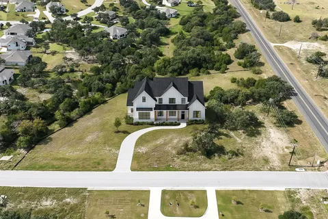 a view of house with outdoor space