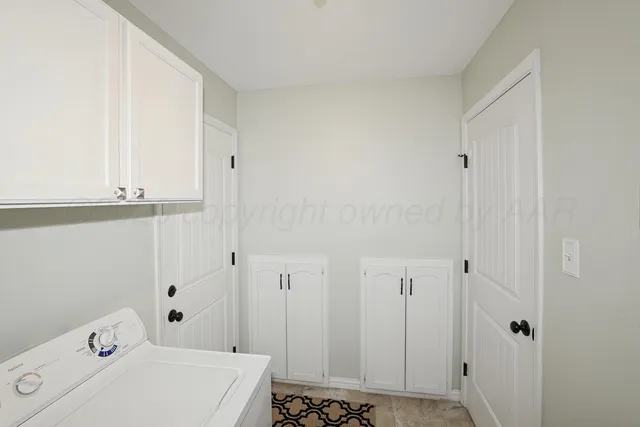 a spacious bedroom with a bed and a ceiling fan