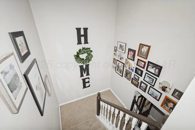 a bed room with a bed and a chandelier
