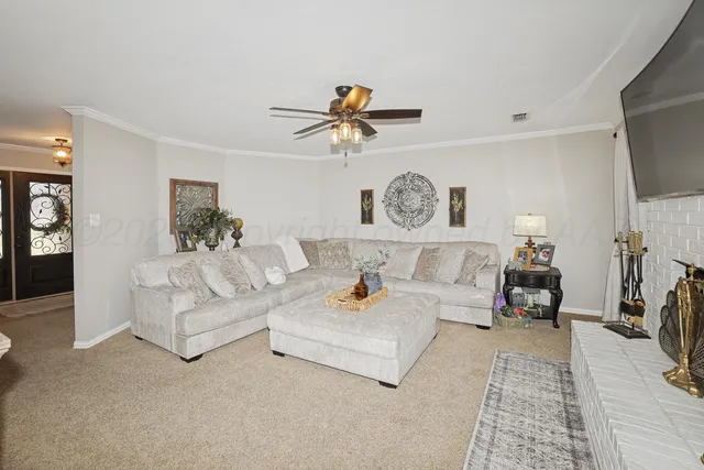 a large kitchen with a table and chairs