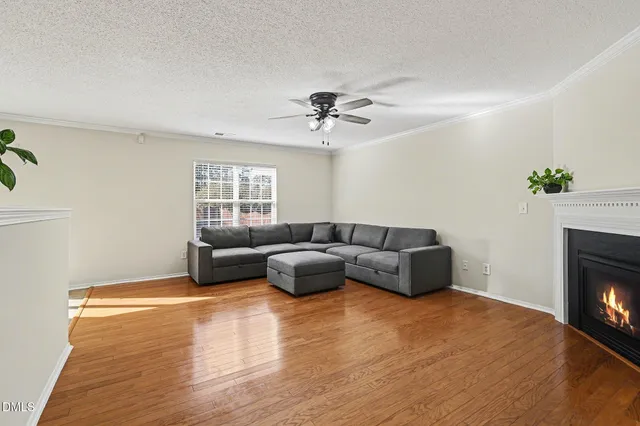 a kitchen with a stove a sink and a refrigerator
