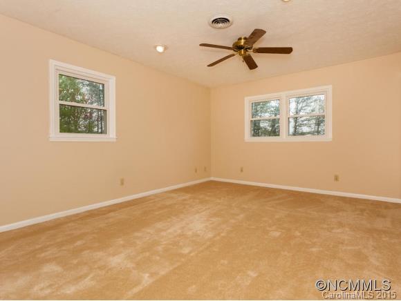 84 Hampton Road Leicester, NC 28748 - Photo 13 of 24 a view of room with a ceiling fan