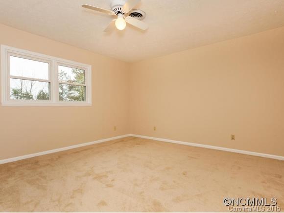 84 Hampton Road Leicester, NC 28748 - Photo 16 of 24 an empty room with a window