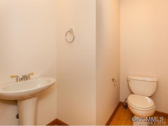84 Hampton Road Leicester, NC 28748 - Photo 19 of 24 a bathroom with a toilet and a sink
