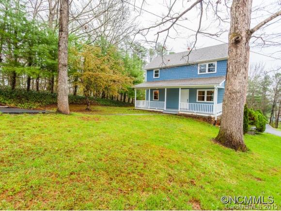 84 Hampton Road Leicester, NC 28748 - Photo 3 of 24 a house view with swimming pool in front of the house