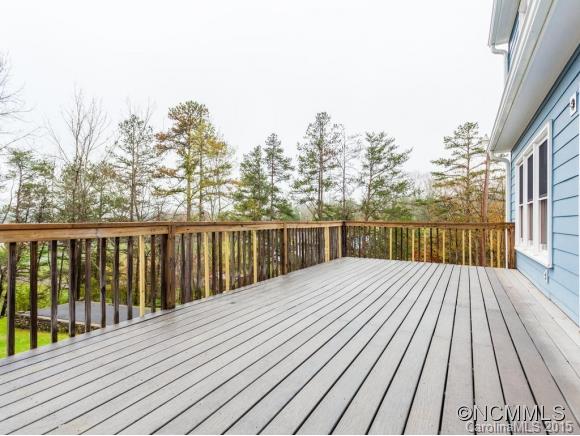 84 Hampton Road Leicester, NC 28748 - Photo 22 of 24 a balcony with wooden floor and fence