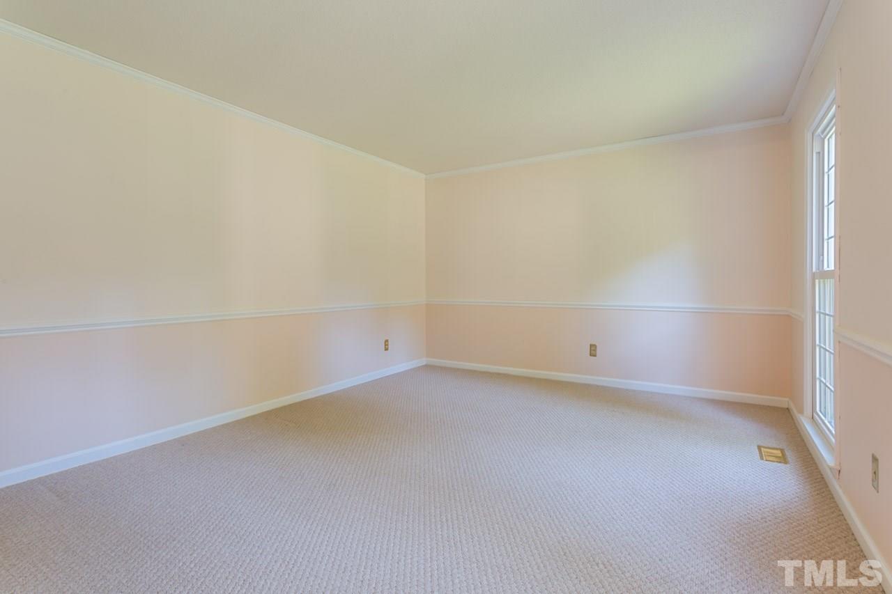 7324 Mill Ridge Road Raleigh, NC 27613 - Photo 8 of 24 a view of an empty room