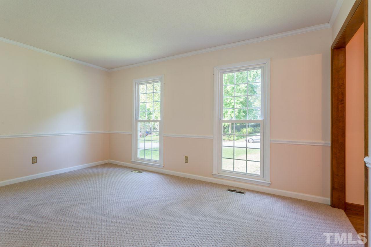 7324 Mill Ridge Road Raleigh, NC 27613 - Photo 9 of 24 an empty room with windows