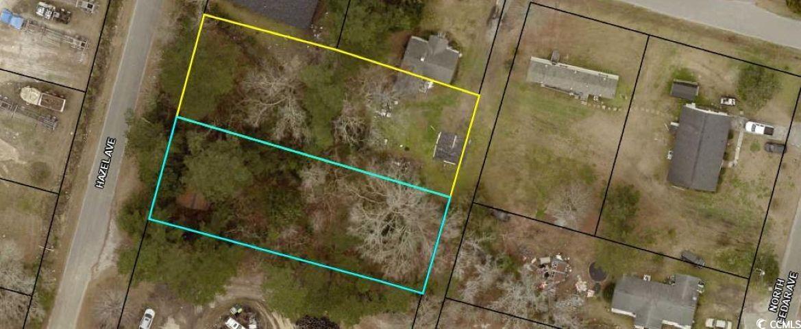 Aerial map of property and surrounding area with property parcel outlined