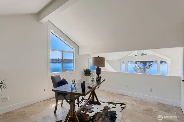 a workspace with furniture and white walls