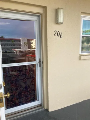a bathroom with a mirror and a shower