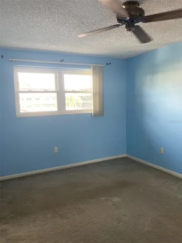 a view of room with clothes