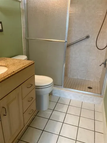 a view of a garden with a lake