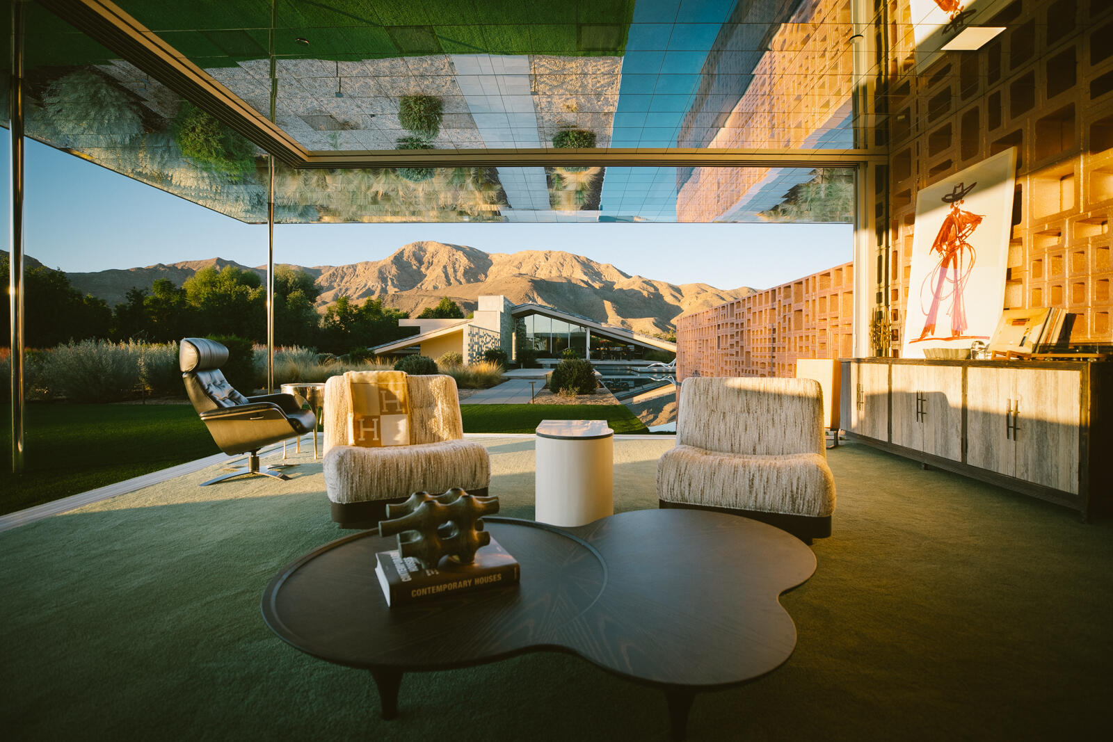 a view of a patio with couches chairs and potted plants