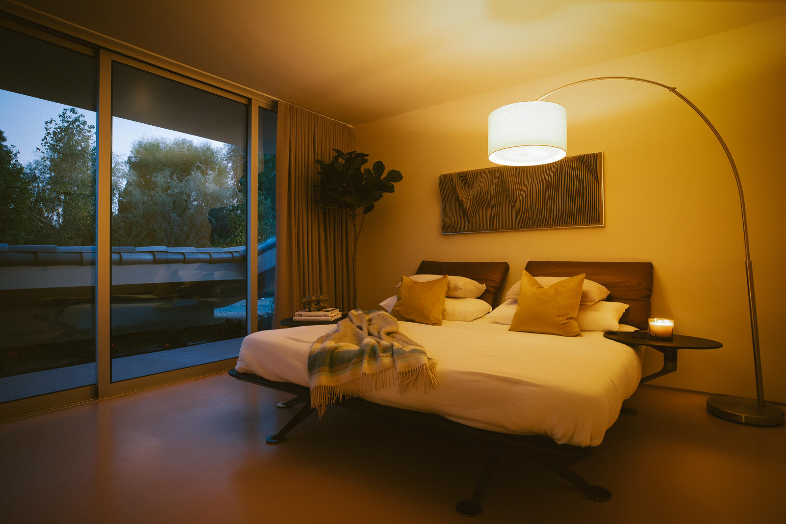38850 Kelly Lane Rancho Mirage, CA 92270 - Photo 26 of 31 a bedroom with a bed and lamp with window