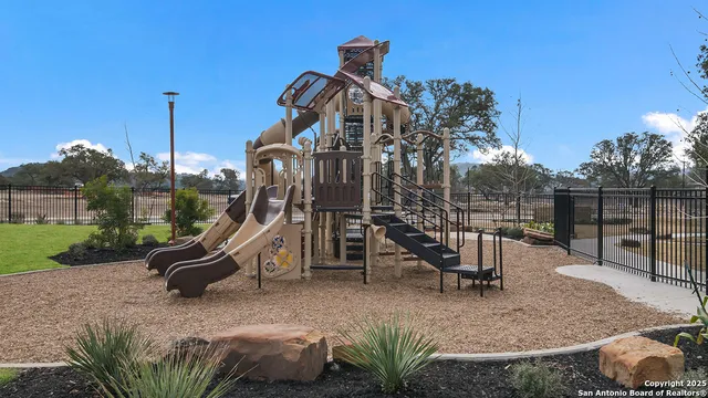 a view of a swimming pool with a lounge chairs